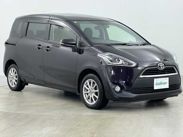 トヨタ シエンタ G クエロ 道央・札幌 2018(平30)年 6.8万km クールボルドーガラスフレーク ・４WD/・寒冷地仕様/・純正SDナビ/　CD/BT/SD/・フルセグTV/・バックカメラ/・前席シートヒーター/・両側パワースライドドア/・ビルトインETC/・衝突軽減ブレーキ/・車線逸脱防止/・先行車発信お知らせ/・横すべり防止/・ワイパーデアイサー/・プッシュスタート/・スマートキー/・スペアキー/・オートマチックハイビーム/・オートライト/・LEDヘッドライト/・フォグランプ/・革巻ステアリング/・ステアリングリモコン/・純正フロアマット/・純正ドアバイザー/・15インチ社外アルミホイール/・積込タイヤ/・取扱説明書