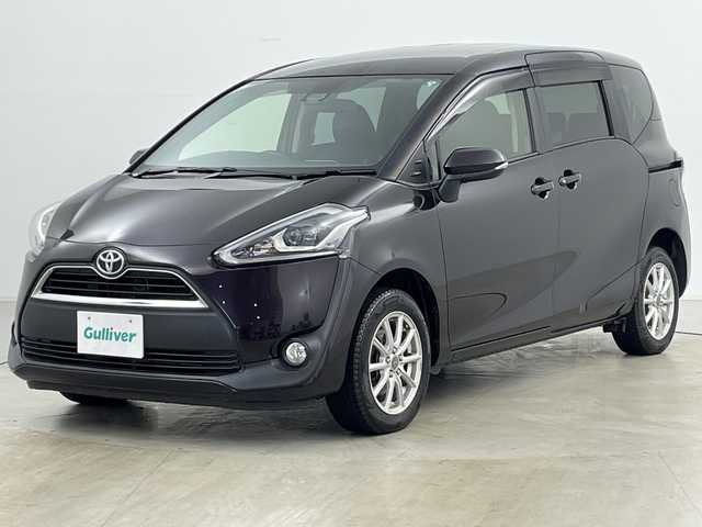 トヨタ シエンタ G クエロ 道央・札幌 2018(平30)年 6.8万km クールボルドーガラスフレーク ・４WD/・寒冷地仕様/・純正SDナビ/　CD/BT/SD/・フルセグTV/・バックカメラ/・前席シートヒーター/・両側パワースライドドア/・ビルトインETC/・衝突軽減ブレーキ/・車線逸脱防止/・先行車発信お知らせ/・横すべり防止/・ワイパーデアイサー/・プッシュスタート/・スマートキー/・スペアキー/・オートマチックハイビーム/・オートライト/・LEDヘッドライト/・フォグランプ/・革巻ステアリング/・ステアリングリモコン/・純正フロアマット/・純正ドアバイザー/・15インチ社外アルミホイール/・積込タイヤ/・取扱説明書