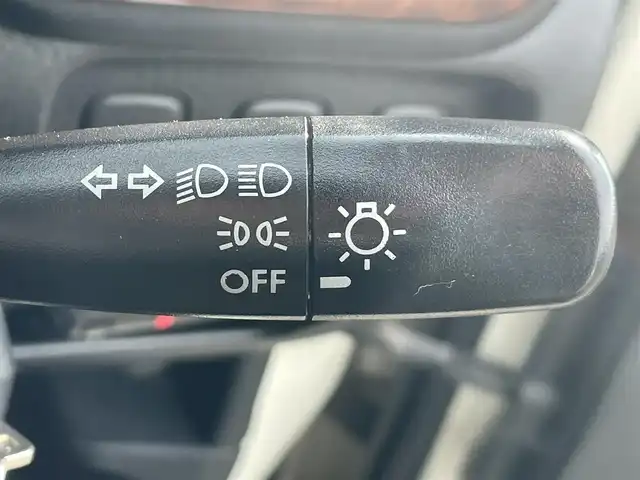 ダイハツ ミラ ジーノ 岡山県 2004(平16)年 15.9万km ホワイトパールマイカ 登録時走行距離：158192km/禁煙車/5速MT/社外オーディオ（DEH-380）/ETC/ブラウンウッドインテリア/ウッドコンピステアリング/ハーフレザーシート/電動格納ミラー/パワーウインドウ/パワーステアリング/メカニカルキー/スペアキー/純正ホイールカバー/取扱説明書/新車時整備手帳（保証書）