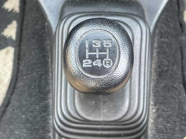 ダイハツ ミラ ジーノ 岡山県 2004(平16)年 15.9万km ホワイトパールマイカ 登録時走行距離：158192km/禁煙車/5速MT/社外オーディオ（DEH-380）/ETC/ブラウンウッドインテリア/ウッドコンピステアリング/ハーフレザーシート/電動格納ミラー/パワーウインドウ/パワーステアリング/メカニカルキー/スペアキー/純正ホイールカバー/取扱説明書/新車時整備手帳（保証書）