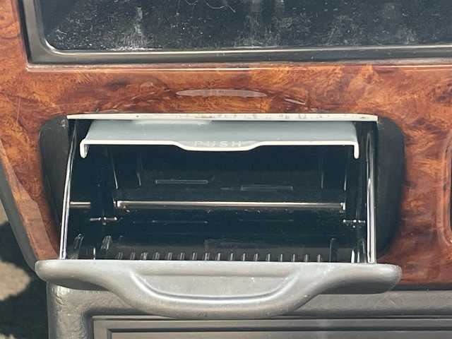 ダイハツ ミラ ジーノ 岡山県 2004(平16)年 15.9万km ホワイトパールマイカ 登録時走行距離：158192km/禁煙車/5速MT/社外オーディオ（DEH-380）/ETC/ブラウンウッドインテリア/ウッドコンピステアリング/ハーフレザーシート/電動格納ミラー/パワーウインドウ/パワーステアリング/メカニカルキー/スペアキー/純正ホイールカバー/取扱説明書/新車時整備手帳（保証書）