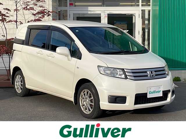 ホンダ フリード スパイク G 青森県 2011(平23)年 15.9万km プレミアムホワイトパール 4WD/純正メモリナビ・ワンセグTV/CD・DVD・USB・SD/バックカメラ/両側スライドドア/ワイパーデアイサー/電動格納ミラー/社外15インチアルミ/スペアキー/純正フロアマット/保証書・取扱書