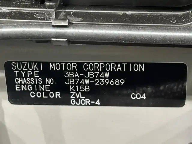 スズキ ジムニー シエラ JC 愛知県 2025(令7)年 0.1万km未満 ミディアムグレー 登録済未使用車　/衝突軽減ブレーキ　/前席シートヒーター　/ＬＥＤヘッドライト　/クルーズコントロール　/コーナーセンサー　/レーンキープアシスト　/ダウンヒルアシスト　/背面タイヤ　/アイドリングストップ　/スマートキー