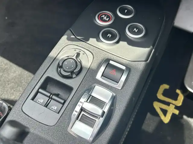 アルファロメオ ４Ｃスパイダー 福岡県 2018(平30)年 2.5万km トロピカリアイエロー カーボンインテリア　/黒革シート　/Ｄ．Ｎ．Ａシステム/ｂｒｅｍｂｏレッドキャリパー　/HIDヘッドライト/パドルシフト/ＲＡＹＳ１７インチアルミホイール/純正アルミホイール/取扱説明書　/保証書　/スペアキー×１/ＥＴＣ