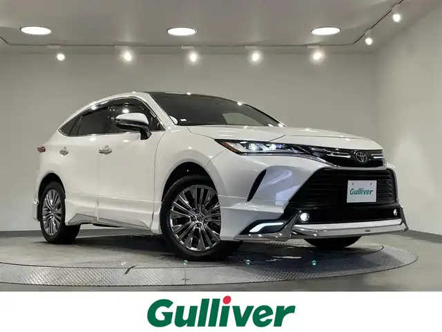トヨタ ハリアー Z レザーパッケージ 愛知県 2021(令3)年 7.2万km ホワイトパールクリスタルシャイン モデリスタエアロ　F/S/R/パノラマ調光ムーンルーフ/純正ナビ/JBLサウンドシステム/ヘッドアップディスプレイ/シートベンチレーション/ステリングヒーター/デジタルインナーミラー/バックカメラ/トヨタセーフティーセンス/衝突軽減ブレーキ/レーンキープアシスト/アダクティブクルーズコントロール/ブラインドスポットモニター/標識検知/踏み間違い防止/先行車発進お知らせ機能/クリアランスソナー/ETC2.0/パワーシート/シートメモリー/スマートキー/プッシュスタート