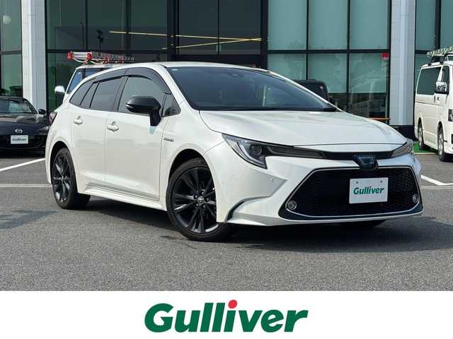 トヨタ カローラツーリング ハイブリッド ダブルバイビー 奈良県 2020(令2)年 5.3万km ホワイトパールクリスタルシャイン 純正ナビ /フルセグTV /BSM /バックカメラ /ETC /ステアリングヒーター /前席シートヒーター /革巻きステアリング /衝突被害軽減システム /ブレーキホールド /前後ドライブレコーダー /クルーズコントロール