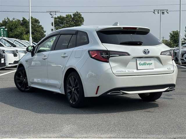 トヨタ カローラツーリング ハイブリッド ダブルバイビー 奈良県 2020(令2)年 5.3万km ホワイトパールクリスタルシャイン 純正ナビ /フルセグTV /BSM /バックカメラ /ETC /ステアリングヒーター /前席シートヒーター /革巻きステアリング /衝突被害軽減システム /ブレーキホールド /前後ドライブレコーダー /クルーズコントロール