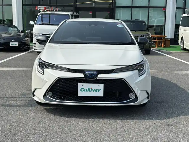トヨタ カローラツーリング ハイブリッド ダブルバイビー 奈良県 2020(令2)年 5.3万km ホワイトパールクリスタルシャイン 純正ナビ /フルセグTV /BSM /バックカメラ /ETC /ステアリングヒーター /前席シートヒーター /革巻きステアリング /衝突被害軽減システム /ブレーキホールド /前後ドライブレコーダー /クルーズコントロール