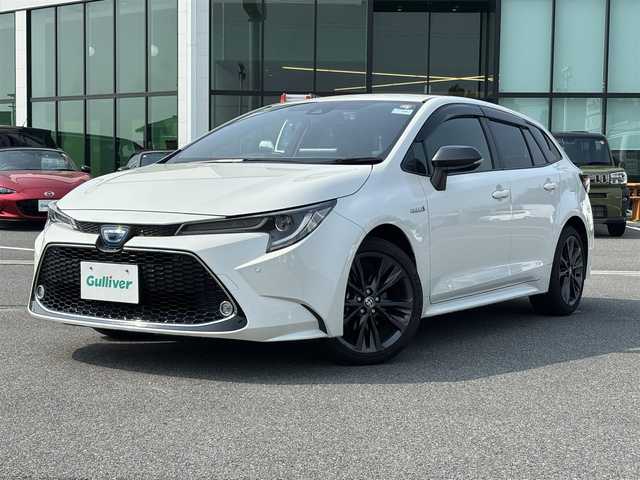 トヨタ カローラツーリング ハイブリッド ダブルバイビー 奈良県 2020(令2)年 5.3万km ホワイトパールクリスタルシャイン 純正ナビ /フルセグTV /BSM /バックカメラ /ETC /ステアリングヒーター /前席シートヒーター /革巻きステアリング /衝突被害軽減システム /ブレーキホールド /前後ドライブレコーダー /クルーズコントロール