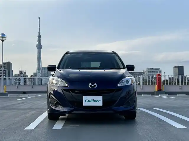 マツダ プレマシー 20E 東京都 2011(平23)年 5.3万km ストーミーブルーマイカ 純正ナビ（NX111)(CD/ワンセグ）/両側パワースライドドア/電動格納ミラー/ETC/社外１５インチアルミ/バイザー・マット/スペアキー１本/保証書/取説