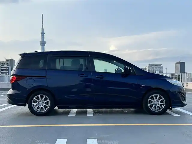 マツダ プレマシー 20E 東京都 2011(平23)年 5.3万km ストーミーブルーマイカ 純正ナビ（NX111)(CD/ワンセグ）/両側パワースライドドア/電動格納ミラー/ETC/社外１５インチアルミ/バイザー・マット/スペアキー１本/保証書/取説