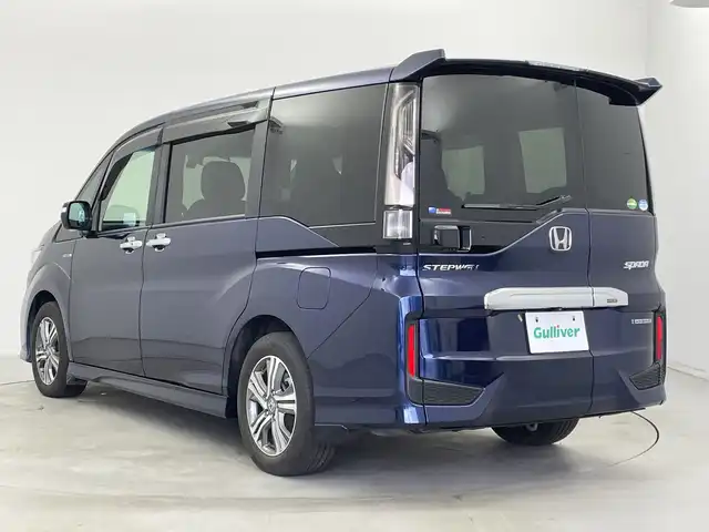ホンダ ステップワゴン スパーダ ハイブリッド G EX ホンダセンシング 新潟県 2018(平30)年 5.8万km オブシダンブルーパール 純正メモリナビ/　フルセグTV/Bluetooth/CD/DVD/USB/ホンダセンシング/・衝突被害軽減ブレーキ/・誤発進抑制機能/・歩行者事故低減ステアリング/・路外逸脱抑制機能/・アダプティブ・クルーズ・コントロール/・車線維持支援システム/・先行車発進お知らせ機能/・標識認識機能/ハーフレザーシート/前席シートヒーター/両側パワースライドドア/純正ドライブレコーダー/全方位モニター/ビルトインETC/LEDヘッドライト/ステアリングスイッチ