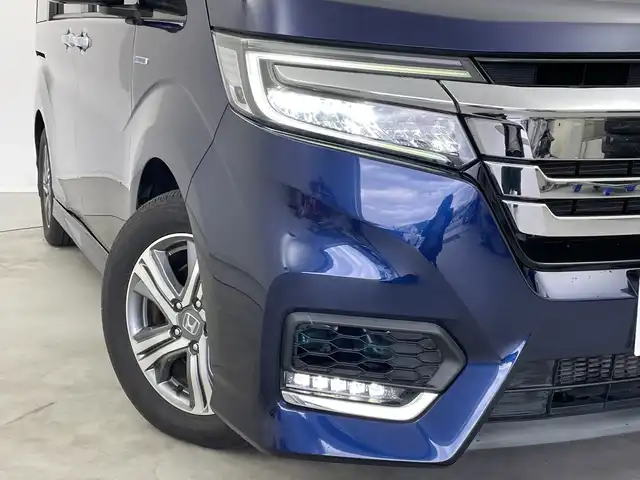 ホンダ ステップワゴン スパーダ ハイブリッド G EX ホンダセンシング 新潟県 2018(平30)年 5.8万km オブシダンブルーパール 純正メモリナビ/　フルセグTV/Bluetooth/CD/DVD/USB/ホンダセンシング/・衝突被害軽減ブレーキ/・誤発進抑制機能/・歩行者事故低減ステアリング/・路外逸脱抑制機能/・アダプティブ・クルーズ・コントロール/・車線維持支援システム/・先行車発進お知らせ機能/・標識認識機能/ハーフレザーシート/前席シートヒーター/両側パワースライドドア/純正ドライブレコーダー/全方位モニター/ビルトインETC/LEDヘッドライト/ステアリングスイッチ