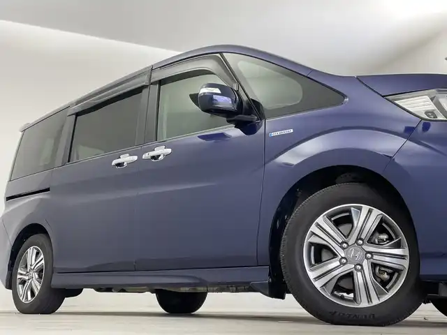 ホンダ ステップワゴン スパーダ ハイブリッド G EX ホンダセンシング 新潟県 2018(平30)年 5.8万km オブシダンブルーパール 純正メモリナビ/　フルセグTV/Bluetooth/CD/DVD/USB/ホンダセンシング/・衝突被害軽減ブレーキ/・誤発進抑制機能/・歩行者事故低減ステアリング/・路外逸脱抑制機能/・アダプティブ・クルーズ・コントロール/・車線維持支援システム/・先行車発進お知らせ機能/・標識認識機能/ハーフレザーシート/前席シートヒーター/両側パワースライドドア/純正ドライブレコーダー/全方位モニター/ビルトインETC/LEDヘッドライト/ステアリングスイッチ