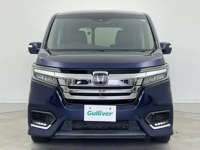 ホンダ ステップワゴン スパーダ ハイブリッド G EX ホンダセンシング 新潟県 2018(平30)年 5.8万km オブシダンブルーパール 純正メモリナビ/　フルセグTV/Bluetooth/CD/DVD/USB/ホンダセンシング/・衝突被害軽減ブレーキ/・誤発進抑制機能/・歩行者事故低減ステアリング/・路外逸脱抑制機能/・アダプティブ・クルーズ・コントロール/・車線維持支援システム/・先行車発進お知らせ機能/・標識認識機能/ハーフレザーシート/前席シートヒーター/両側パワースライドドア/純正ドライブレコーダー/全方位モニター/ビルトインETC/LEDヘッドライト/ステアリングスイッチ