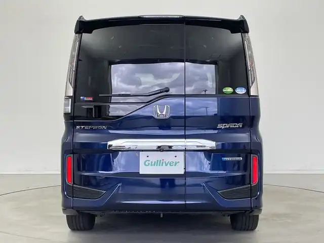 ホンダ ステップワゴン スパーダ ハイブリッド G EX ホンダセンシング 新潟県 2018(平30)年 5.8万km オブシダンブルーパール 純正メモリナビ/　フルセグTV/Bluetooth/CD/DVD/USB/ホンダセンシング/・衝突被害軽減ブレーキ/・誤発進抑制機能/・歩行者事故低減ステアリング/・路外逸脱抑制機能/・アダプティブ・クルーズ・コントロール/・車線維持支援システム/・先行車発進お知らせ機能/・標識認識機能/ハーフレザーシート/前席シートヒーター/両側パワースライドドア/純正ドライブレコーダー/全方位モニター/ビルトインETC/LEDヘッドライト/ステアリングスイッチ