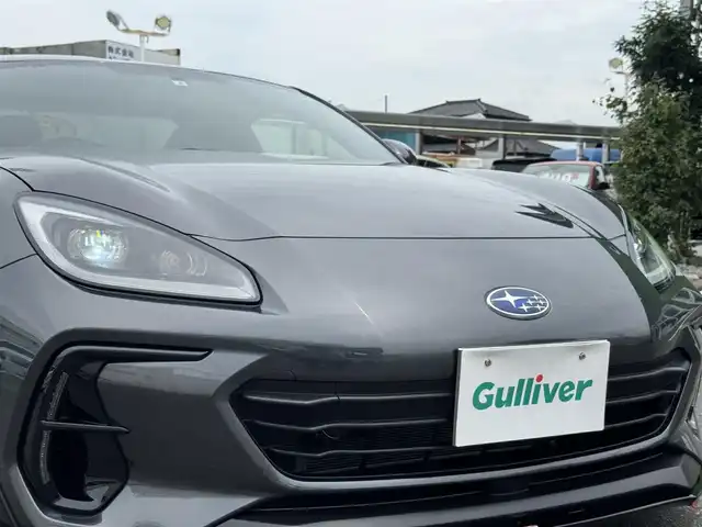 スバル ＢＲＺ S 千葉県 2022(令4)年 0.6万km マグネタイトグレーメタリック ワンオーナー/6速MT車/STiエアロパーツ/STiマフラ０/LEDヘッドライト/クルーズコントロール/純正SDナビ/Bluetooth/バックカメラ/DVD再生機能/ETC/革巻きステアリング/ハーフレザーシート/シートヒーター/純正フロアマット/純正18インチアルミホイール/取扱説明書＆保証書/プッシュスタート/スマートキー/スペアキー