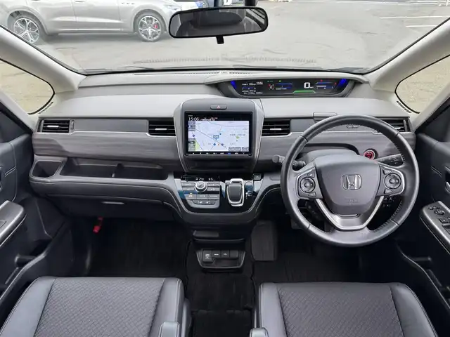 ホンダ フリード ハイブリット G ホンダセンシング 千葉県 2020(令2)年 5.4万km クリスタルブラックパール Honda SENSING/　衝突軽減ブレーキ（CMBS）/　誤発進抑制機能/　歩行者事故低減ステアリング/　先行車発進お知らせ機能/　標識認識機能/　路外逸脱抑制機能/　アダプティブクルーズコントロール（ACC）/　車線維持支援/　システム（LKAS）/　後方誤発進抑制機能/純正8インチナビ/フルセグTV/Bluetooth/CarPlay/バックカメラ/D/N席シートヒーター/両側電動スライドドア/前後ドライブレコーダー/LEDライト/ETC/純正15インチAW