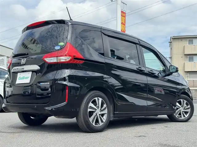ホンダ フリード ハイブリット G ホンダセンシング 千葉県 2020(令2)年 5.4万km クリスタルブラックパール Honda SENSING/　衝突軽減ブレーキ（CMBS）/　誤発進抑制機能/　歩行者事故低減ステアリング/　先行車発進お知らせ機能/　標識認識機能/　路外逸脱抑制機能/　アダプティブクルーズコントロール（ACC）/　車線維持支援/　システム（LKAS）/　後方誤発進抑制機能/純正8インチナビ/フルセグTV/Bluetooth/CarPlay/バックカメラ/D/N席シートヒーター/両側電動スライドドア/前後ドライブレコーダー/LEDライト/ETC/純正15インチAW
