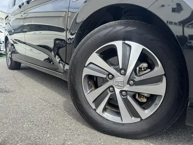 ホンダ フリード ハイブリット G ホンダセンシング 千葉県 2020(令2)年 5.4万km クリスタルブラックパール Honda SENSING/　衝突軽減ブレーキ（CMBS）/　誤発進抑制機能/　歩行者事故低減ステアリング/　先行車発進お知らせ機能/　標識認識機能/　路外逸脱抑制機能/　アダプティブクルーズコントロール（ACC）/　車線維持支援/　システム（LKAS）/　後方誤発進抑制機能/純正8インチナビ/フルセグTV/Bluetooth/CarPlay/バックカメラ/D/N席シートヒーター/両側電動スライドドア/前後ドライブレコーダー/LEDライト/ETC/純正15インチAW