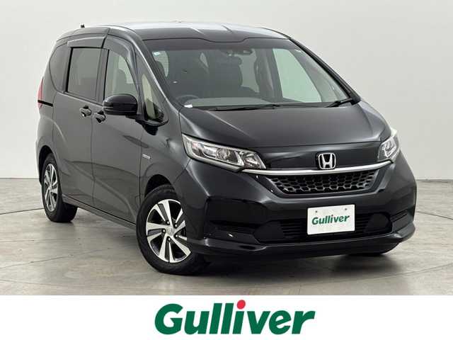 ホンダ フリード ハイブリット G ホンダセンシング 福岡県 2020(令2)年 5.5万km クリスタルブラックパール 純正ナビ／フルセグＴＶ／ＢＴ　/ＥＴＣ　/ドライブレコーダー　/両側パワースライドドア　/レーダークルーズコントロール　/衝突被害システム　/レーンキープ　/横滑り防止　/シートヒーター　/純正１５インチＡＷ　/ＬＥＤ