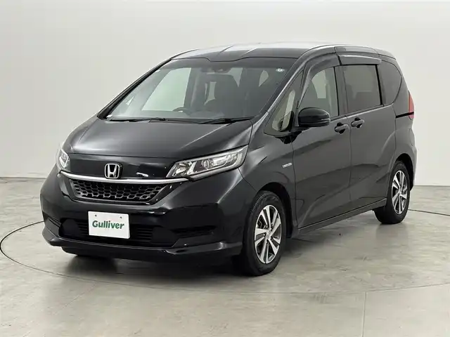 ホンダ フリード ハイブリット G ホンダセンシング 福岡県 2020(令2)年 5.5万km クリスタルブラックパール 純正ナビ／フルセグＴＶ／ＢＴ　/ＥＴＣ　/ドライブレコーダー　/両側パワースライドドア　/レーダークルーズコントロール　/衝突被害システム　/レーンキープ　/横滑り防止　/シートヒーター　/純正１５インチＡＷ　/ＬＥＤ