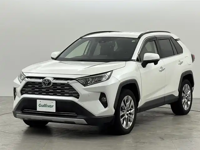 トヨタ ＲＡＶ４ G Zパッケージ 福岡県 2019(令1)年 4.1万km ホワイトパールクリスタルシャイン 純正９型ナビ／フルセグＴＶ　/バックカメラ　/デジタルルームミラー　/ビルトインETC　/ドライブレコーダー　/トヨタセーフティセンス　/レーダークルーズコントロール　/コーナーセンサー　/衝突軽減ブレーキ　/レーンキープ　/ブラインドスポットモニター　/アクセル踏み間違い防止　/ダウンヒルアシストコントロール　/パワーシート　/シートヒーター　/ステアリングヒーター　/パワーバックドア　/ルーフレール　/ＬＥＤヘッドライト　/純正１９インチアルミホイール