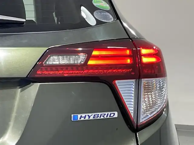 ホンダ ヴェゼル ハイブリッド X 愛知県 2015(平27)年 6.8万km ミスティックグリーンパール 純正ナビ/FM/AM/SD/DVD/HDMI/Bluetooth/ワンセグ/パドルシフト/ステアリングリモコン/LEDヘッドライト/フォグランプ/ドアバイザー/プッシュスタート/保証書・取説/ワンオーナー/スマートキー/オートエアコン/スペアキー/クルーズコントロール/ETC/バックカメラ/純正フロアマット/純正アルミホイール/オートライト