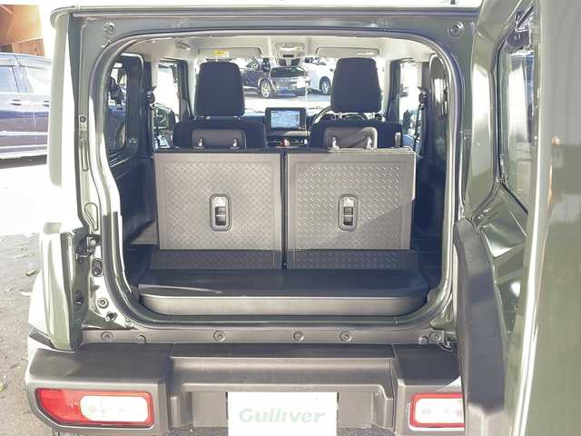 スズキ ジムニー シエラ JC 長野県 2024(令6)年 1.1万km ジャングルグリーン ４ＷＤ/純正メモリナビフルセグＴＶ/バックカメラ/ＥＴＣ/純正15インチアルミ/シートヒーター/アイドリングストップ/レーンキープ/パーキングアシスト/ワンオーナー/保証書・取説