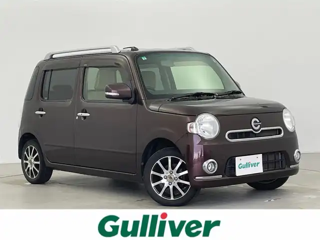 ダイハツ ミラ ココア プラスX 富山県 2013(平25)年 7.7万km プラムブラウンクリスタルマイカ 4WD/社外ナビ/CD/DVD/BT/SD/USB/フルセグTV/ETC/横滑り防止装置/スマートキー/電動格納ミラー/フォグランプ/保証書/取扱説明書