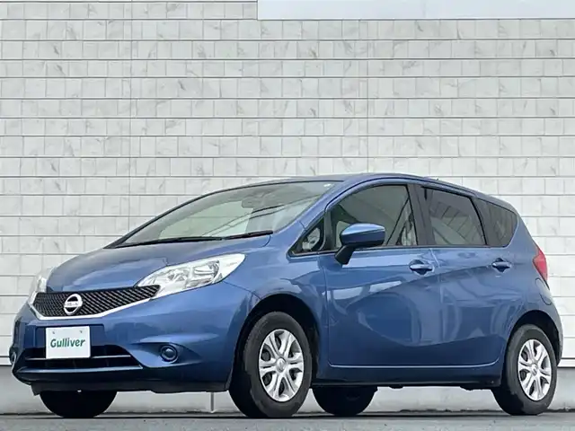 日産 ノート X FOUR 岩手県 2015(平27)年 10.8万km シャイニングブルー 禁煙車/パートタイム4WD/純正SDナビ/フルセグTV/CD/DVD/FM/AM/USB入力端子/バックカメラ/衝突被害軽減ブレーキ/レーンキープアシスト/横滑り防止装置/シガーソケット/電動格納ミラー/ヘッドライトレベライザー/スペアキー/ETC/ドラレコ