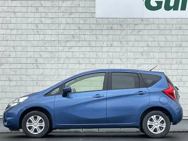 日産 ノート X FOUR 岩手県 2015(平27)年 10.8万km シャイニングブルー 禁煙車/パートタイム4WD/純正SDナビ/フルセグTV/CD/DVD/FM/AM/USB入力端子/バックカメラ/衝突被害軽減ブレーキ/レーンキープアシスト/横滑り防止装置/シガーソケット/電動格納ミラー/ヘッドライトレベライザー/スペアキー/ETC/ドラレコ
