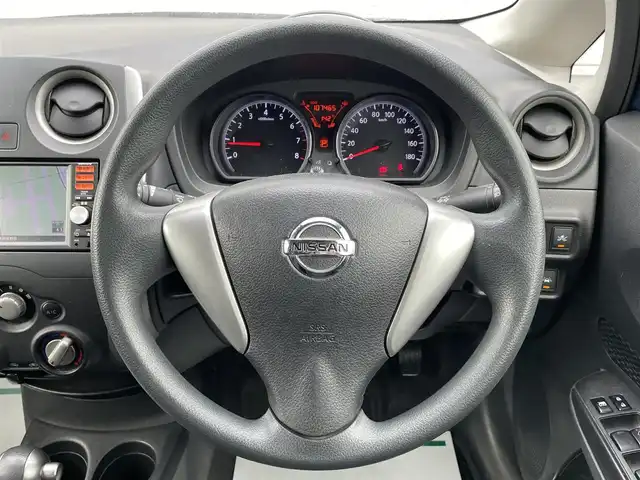 日産 ノート X FOUR 岩手県 2015(平27)年 10.8万km シャイニングブルー 禁煙車/パートタイム4WD/純正SDナビ/フルセグTV/CD/DVD/FM/AM/USB入力端子/バックカメラ/衝突被害軽減ブレーキ/レーンキープアシスト/横滑り防止装置/シガーソケット/電動格納ミラー/ヘッドライトレベライザー/スペアキー/ETC/ドラレコ