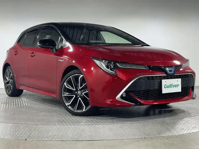 トヨタ カローラ スポーツ ハイブリッドG Z 神奈川県 2020(令2)年 3.1万km アティチュードブラックマイカ/ダークブルーマイカメタリック 2トーン 純正ディスプレイオーディオ/ナビ/フルセグTVキット付き/BT/MiraCast/AM/FM/バックカメラ/ビルトインETC/デジタルインナーミラー/ドライブレコーダー/セーフティセンス/・プリクラッシュセーフティ/・レーントレーシングアシスト/レーンディパーチャーアラート/・レーダークルーズコントロール/・オートマチックハイビーム/・ロードサインアシスト/・ドライバー異常時対応システム/・発進遅れ告知機能/スマートキー/プッシュスタートボタン/革巻きステアリング/ステアリングスイッチ/Autoライト/ヘッドライトレベライザー/LEDヘッドライト/フォグランプ/コーナーセンサー/SOSボタン/電動格納ミラー/ウィンカーミラー/シートリフター/ダブル/サイド/カーテンエアバッグ/純正フロアマット/純正ドアバイザー/純正18インチアルミホイール