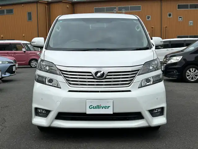 トヨタ ヴェルファイア 2．4Z プラチナセレクションⅡ 静岡県 2010(平22)年 9.4万km ホワイトパールクリスタルシャイン ワンオーナー/社外HDDナビ（VIE-X088）/フルセグTV/DVD/CD/USB/SD/社外フリップダウンモニター/バックカメラ/両側パワースライド/パワーバックドア/純正18インチアルミホイール/ウッドコンビハンドル/HIDライト/ビルトインETC/スマートキー2個/プッシュスタート/新車時保証書
