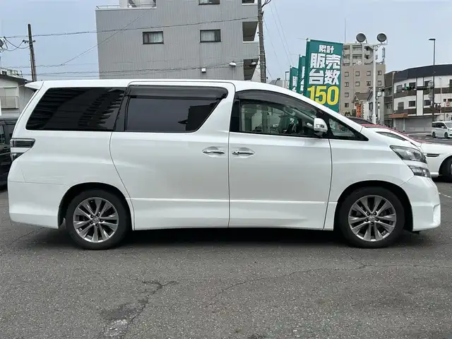 トヨタ ヴェルファイア 2．4Z プラチナセレクションⅡ 静岡県 2010(平22)年 9.4万km ホワイトパールクリスタルシャイン ワンオーナー/社外HDDナビ（VIE-X088）/フルセグTV/DVD/CD/USB/SD/社外フリップダウンモニター/バックカメラ/両側パワースライド/パワーバックドア/純正18インチアルミホイール/ウッドコンビハンドル/HIDライト/ビルトインETC/スマートキー2個/プッシュスタート/新車時保証書