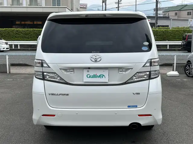 トヨタ ヴェルファイア 2．4Z プラチナセレクションⅡ 静岡県 2010(平22)年 9.4万km ホワイトパールクリスタルシャイン ワンオーナー/社外HDDナビ（VIE-X088）/フルセグTV/DVD/CD/USB/SD/社外フリップダウンモニター/バックカメラ/両側パワースライド/パワーバックドア/純正18インチアルミホイール/ウッドコンビハンドル/HIDライト/ビルトインETC/スマートキー2個/プッシュスタート/新車時保証書