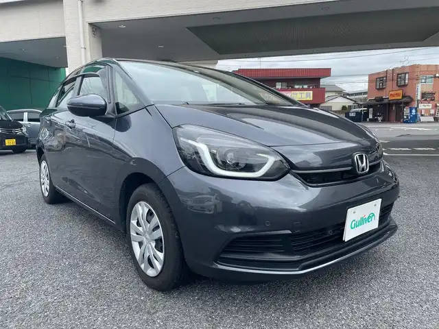ホンダ フィット ホーム 茨城県 2023(令5)年 1.5万km メテオロイドグレーメタリック ワンオーナー/9インチホンダコネクトディスプレーナビ/ETC2.0/ホンダセンシング/・車線逸脱/・踏み間違え軽減システム/・パーキングセンサー/・衝突軽減ブレーキ/LEDヘッドライト/純正ドライブレコーダー（前方）/レーダークルーズコントロール/ステアリングスイッチ/オートライト/電格ミラー/合皮ハーフレザーシート/純正バイザー/純正フロアマット
