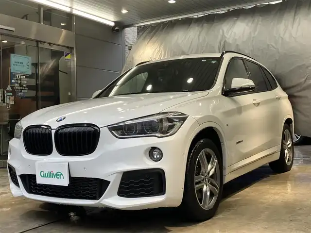 ＢＭＷ Ｘ１ xDrive 20i Mスポーツ 東京都 2018(平30)年 1.9万km アルピンホワイトⅢ ワンオーナー /ドライビングアシスト/・レーンディパーチャーニング・/・前車接近警告機能/・衝突回避・被害軽減ブレーキ/純正ナビゲーション/Bカメラ/ドライブレコーダー/ETC/スマートキー/純正ルーフレール/純正アルミホイール/パワーバックドア/スポーツモード搭載/ISOFIX/点検整備記録簿H30R123456年