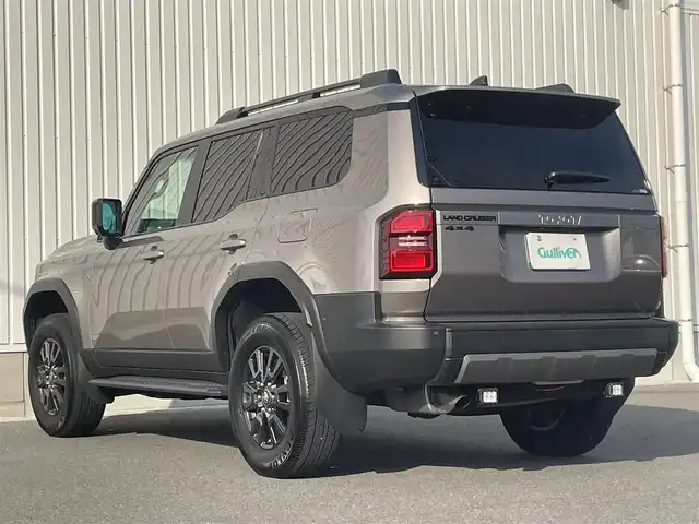 トヨタ ランドクルーザー ２５０ VX 群馬県 2024(令6)年 0.5万km アバンギャルドブロンズメタリック ワンオーナー/サンルーフ/パワーバックドア/デジタルインナーミラー/純正12.3インチディスプレイオーディオ　/(AM/FM/BT/TV/USB)/全方位カメラ/トヨタセーフティーセンス/レーンディパーチャーアラート/プリクラッシュセーフティー/ブラインドスポットモニター/クリアランスソナー/プロアクティブドライビングアシスト/リヤクロストラフィックアラート/レーダークルーズコントロール/後方車両接近告知/安心降車アシスト/リヤカメラディテクション/周辺車両接近時サポート/ロードサインアシスト/AUTOライト/AUTOハイビーム/ビルトインETC2.0/前後ドライブレコーダー/前席シートヒーター/エアシート/ステアリングヒーター/ステアリングリモコン/純正フロアマット/保証書/取扱説明書/記録簿/スペアキー1
