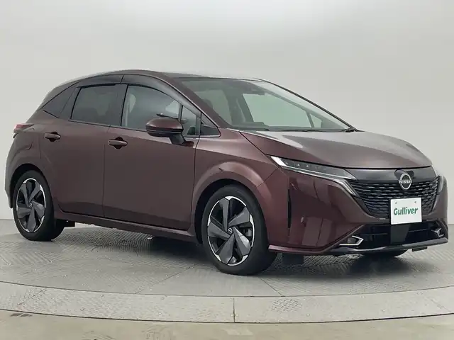 日産 オーラ G 新潟県 2022(令4)年 1.1万km バーガンディー 登録時距離/　１０４７３km/純正メモリーナビ/フルセグ＆ＤＶＤ＆ＢＴ/アラウンドビューモニター/スマートキー/スペアキー/ＬＥＤ/左右バニティミラー/ドライブレコーダー/革巻ステアリング/左右バニティミラー/取説