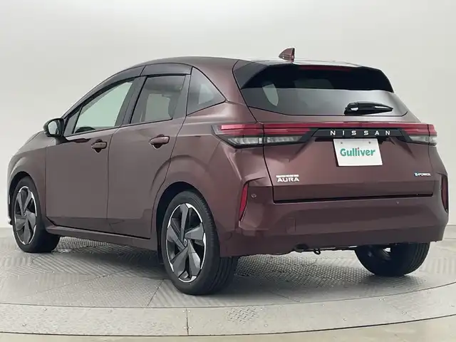 日産 オーラ G 新潟県 2022(令4)年 1.1万km バーガンディー 登録時距離/　１０４７３km/純正メモリーナビ/フルセグ＆ＤＶＤ＆ＢＴ/アラウンドビューモニター/スマートキー/スペアキー/ＬＥＤ/左右バニティミラー/ドライブレコーダー/革巻ステアリング/左右バニティミラー/取説