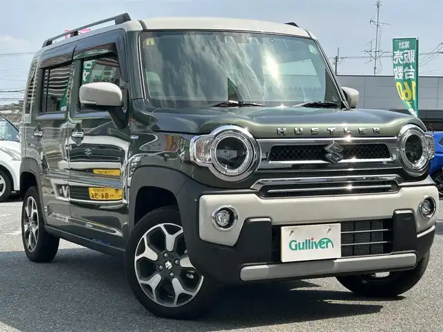 スズキ ハスラー Jスタイル Ⅱ ターボ 奈良県 2023(令5)年 0.6万km クールカーキパールメタリック/ソフトベージュメタリック ワンオーナー/純正7インチナビ/(フルセグTV/CD/DVD/BT/SD)/バックカメラ/デュアルカメラブレーキサポート/衝突軽減防止/レーンキープアシスト/リアパーキングセンサー/ふらつき防止/ドライブレコーダー前後/ビルトインETC/シートヒーター(D＋N席)/アクティブクルーズコントロール/オートエアコン(ナノイーX)/革巻きステアリング/ステアリングスイッチ/パドルシフト/オートライト/ハイビームアシスト/アイドリングストップ/ドライブセレクト/ルーフレール/プッシュスタート＆スマートキ/ウインカー付き電動格納ミラー/LEDヘッドライト/フォグランプ/ドアバイザー/フロアマット/純正15インチAW