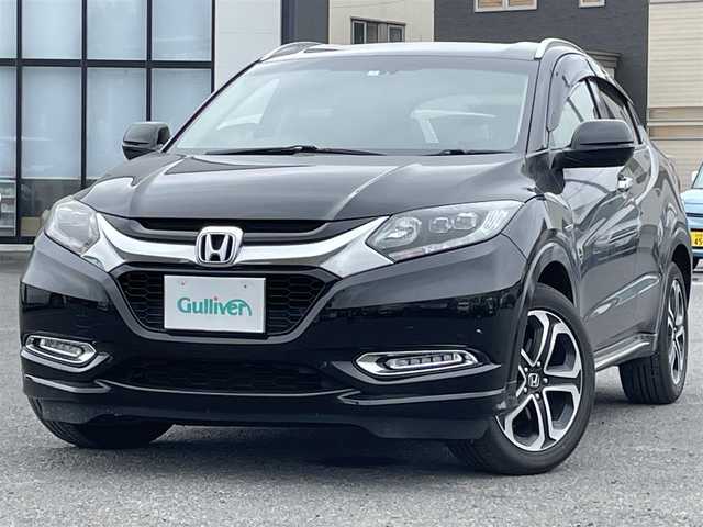 ホンダ ヴェゼル ハイブリッド Z ホンダセンシング 道央・札幌 2016(平28)年 18.5万km クリスタルブラックパール ワンオーナー/純正ディーラーOPナビ/CD/DVD/BT/フルセグ/ホンダセンシング/衝突被害軽減ブレーキ/横滑り防止装置/クルーズコントロール/バックカメラ/ビルトインETC/自動防眩ミラー/ワイパーデアイサー/ECONモード/アイドリングストップ/前席シートヒーター/革巻きステアリング/ステアリングリモコン/パドルシフト/電動パーキング/ブレーキホールド/プッシュスタート/スマートキー/LEDヘッドライト/オートライト/フォグランプ/電動格納ミラー/ヒーテッドドアミラー/ウィンカーミラー/純正フロアマット/ドアバイザー/スペアキー/純正エンジンスターター
