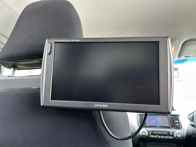トヨタ ランドクルーザー プラド TX 福岡県 2015(平27)年 4.6万km ホワイトパールクリスタルシャイン ALPINEナビ（Bluetooth・フルセグTV）/ECLIPSE後席用モニター/リフトアップ/ドライブレコーダー（前後）/MKWアルミホイール/ルーフレール/ダウンヒルアシストコントロール/エアバッグ（運転席・助手席・サイド）/カーテンエアバッグ/ETC/スペアタイヤ/電格ミラー/純正フロアマット/布系シート/横滑り防止装置/パワーステアリング/パワーウィンドウ/スマートキー/バックカメラ/ABS/プッシュスタート/保証書/取扱説明書