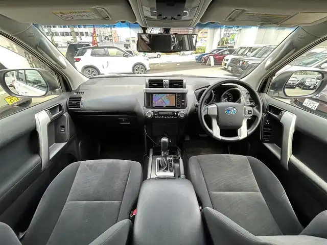 トヨタ ランドクルーザー プラド TX 福岡県 2015(平27)年 4.6万km ホワイトパールクリスタルシャイン ALPINEナビ（Bluetooth・フルセグTV）/ECLIPSE後席用モニター/リフトアップ/ドライブレコーダー（前後）/MKWアルミホイール/ルーフレール/ダウンヒルアシストコントロール/エアバッグ（運転席・助手席・サイド）/カーテンエアバッグ/ETC/スペアタイヤ/電格ミラー/純正フロアマット/布系シート/横滑り防止装置/パワーステアリング/パワーウィンドウ/スマートキー/バックカメラ/ABS/プッシュスタート/保証書/取扱説明書