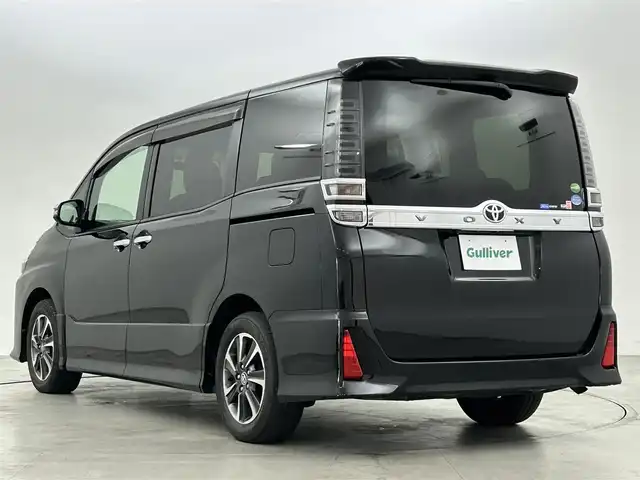 トヨタ ヴォクシー ZS 煌 福岡県 2019(平31)年 8.6万km ブラック 後席モニター　/純正９型ナビ　/ビルトインＥＴＣ　/前後ドラレコ　/クルーズコントロール　/衝突軽減ブレーキ　/レーンキープ　/アイドリングストップ　/両側電動スライドドア　/ＭＴモード付き　/純正１６インチＡＷ　/ＬＥＤ