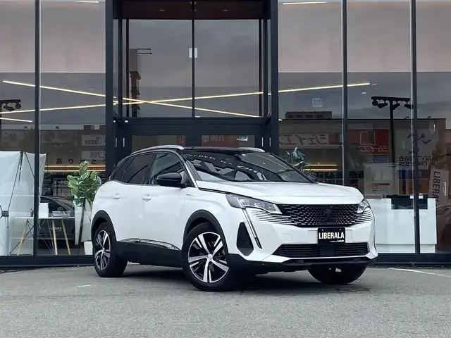 プジョー ３００８ GT ハイブリッド4 福岡県 2022(令4)年 1.4万km パールⅡ ・サンルーフ/・アクティブクルーズコントロール/・純正メモリーナビ/USB/Bluetooth/AppleCarPlay/・全方位カメラ/・ハーフレザーシート/シートヒーター/・社外前後ドライブレコーダー/・フルセグ/・社外ETC/・純正18AW/・プッシュスタート/・パーキングアシスト/・スマートキー/・スペアキー/・運転席パワーシート/・レーンキープアシスト/・オートライト/・LEDライト/・保証書