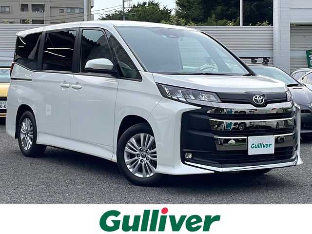 トヨタ ノア S－G 東京都 2023(令5)年 1.6万km ホワイトパールクリスタルシャイン ワンオーナー/純正ディスプレイオーディオ10.5インチ/フルセグTV/DVDプレイヤー/AppleCarplay/バックカメラ　ETC2.0/プリクラッシュセーフティ/レーンディパーチャーアラート/レーダークルーズコントロール/レーントレーシングアシスト/ロードサインアシスト/オートマチックハイビーム/プロアクティブドライビングアシスト/片側側パワースライドドア/コーナーセンサー/ステアリングスイッチ/純正15インチアルミホイール/LEDヘッドライト/オートライト/スマートキー×２/純正フロアマット