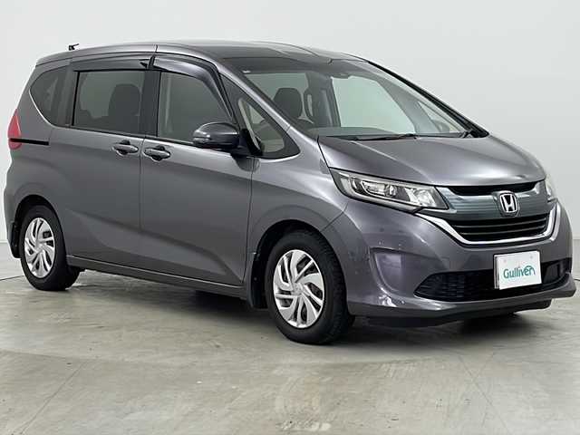 ホンダ フリード G ホンダセンシング 道央・札幌 2018(平30)年 6.5万km モダンスティールM ・寒冷地仕様/・純正ナビ&CD&DVD&SD&BT&フルセグ/・純正フリップダウンモニター/・バックカメラ/・両側パワースライドドア/・衝突軽減ブレーキ/・レーダークルーズコントロール/・ドアミラーヒーター/・純正ドライブレコーダー/・LEDヘッドライト/・社外AW付スタッドレス積載
